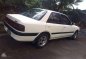 Mazda 323 Familia 97 model MT-5