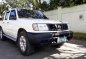 2012 Nissan Frontier Price: NEG M/T White-8