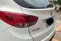 Hyundai Tucson 2011 theta white gasoline Rush-0