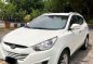 Hyundai Tucson 2011 theta white gasoline Rush-4