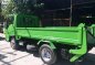 1999 Isuzu Elf Recon Dropside Cargo with Power tailgate 4x2 4HF1-2