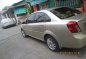 For Sale: Chevrolet Optra gold Makisig 2003-7