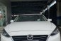 Selling Pearl White Mazda 2 2014 in Pasig-0