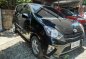 Selling Black 2014 Toyota Wigo in Marikina-0