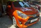 Selling Orange Toyota Wigo 2019 Manual Gasoline in Quezon City-0