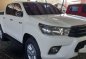 Selling White Toyota Hilux 2016 at 8800 km in Quezon City-0