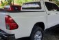 Selling White Toyota Hilux 2016 at 8800 km in Quezon City-2
