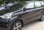 Selling Black Toyota Avanza 2018 Automatic Gasoline for sale in Quezon City-1