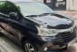 Selling Black Toyota Avanza 2018 Automatic Gasoline for sale in Quezon City-0