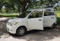 Selling White Toyota Avanza 2007 at 298000 km in Davao City-1