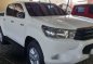 Selling White Toyota Hilux 2016 at 8800 km in Quezon City-0