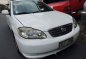 White Toyota Corolla Altis 2004 for sale in Quezon City-7