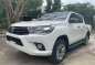 Selling White Toyota Hilux 2016 Manual Diesel in Quezon City-0
