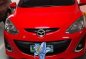 Red Mazda 2 2013 for sale in Marilao-0