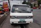 Selling White Mitsubishi L300 2012 at 70000 km in Quezon City-0
