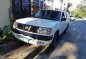 White Nissan Frontier 2010 at 70000 km for sale-1