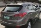 Selling Brown Hyundai Tucson 2011 Automatic Gasoline at 83000 km in Quezon City-2