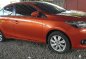 Orange Toyota Vios 2015 at 10000 km for sale in Quezon City-1