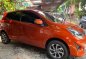 Selling Orange Toyota Wigo 2019 Hatchback Manual Gasoline in Quezon City-0