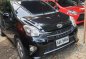 Black Toyota Wigo 2014 Automatic Gasoline for sale in Quezon City-0
