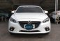 White Mazda 3 2015 at 15000 km for sale-1