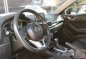 White Mazda 3 2015 at 15000 km for sale-8