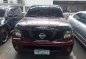 Red Nissan Frontier 2009 Automatic Diesel for sale-1