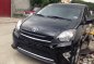 Black Toyota Wigo 2014 Hatchback for sale in Quezon City-1