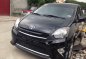 Black Toyota Wigo 2014 Hatchback for sale in Quezon City-1