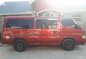 Red Nissan Urvan 2010 for sale in Pagsanjan-2