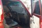 Red Nissan Urvan 2010 for sale in Pagsanjan-4