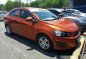 Orange Chevrolet Sonic 2015 at 30303 km for sale -0