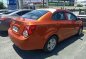 Orange Chevrolet Sonic 2015 at 30303 km for sale -2