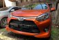 Orange Toyota Wigo 2017 for sale in Quezon City-1