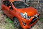 Orange Toyota Wigo 2017 for sale in Quezon City-2