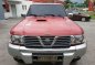 Selling Red Nissan Patrol 2001 at 141000 km -0
