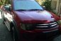 Red Mitsubishi Strada 2010 at 74000 km for sale in Cabuyao-0