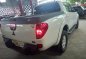 Selling White Mitsubishi Strada 2014 Automatic Diesel -6