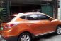 Orange Hyundai Tucson 2013 at 39125 km for sale-4