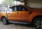 Orange Ford Ranger 2016 Automatic Diesel for sale in Manila-4