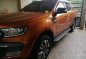 Orange Ford Ranger 2016 Automatic Diesel for sale in Manila-3