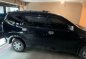 Selling Black Toyota Avanza 2011 in Pasig-6