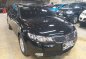 Selling Black Kia Forte 2013 Automatic Gasoline in Quezon City -3