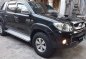 Black Toyota Hilux 2010 at 85000 km for sale in Manila-0