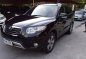 Black Hyundai Santa Fe 2012 at 67873 km for sale in Pasig-1