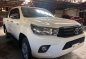 Selling White Toyota Hilux 2016 in Quezon City-1