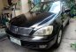 Black Nissan Sentra 2004 at 100000 km for sale in Parañaque-0