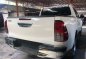 Selling White Toyota Hilux 2016 in Quezon City-2