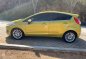 Yellow Ford Fiesta 2016 Hatchback Automatic Gasoline for sale in Manila-2