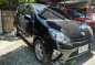 Sell Black 2014 Toyota Wigo in Quezon City-0